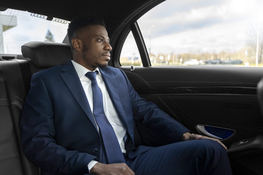 Long Distance 1 LimoShuttle elegant driver giving taxi ride 2048x1366 1